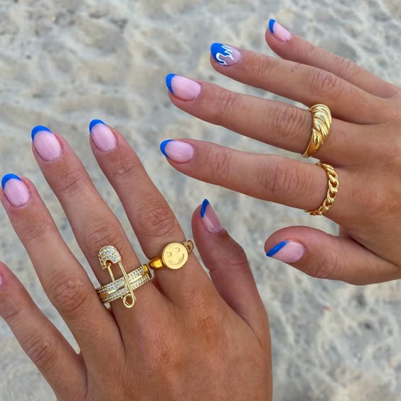 13. Blue Short Vacation French Nails in Almond Shape